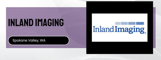 Inland Imaging logo with 'Spokane Valley, WA' text on a purple background